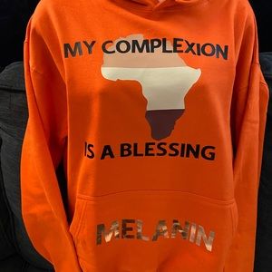 Women size large hoodie. Color orange.